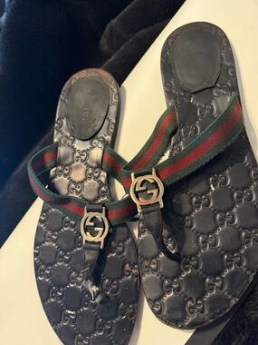Gucci Black Leather Embossed GG Slide Sandals with Green-Red Web and Gold Logo